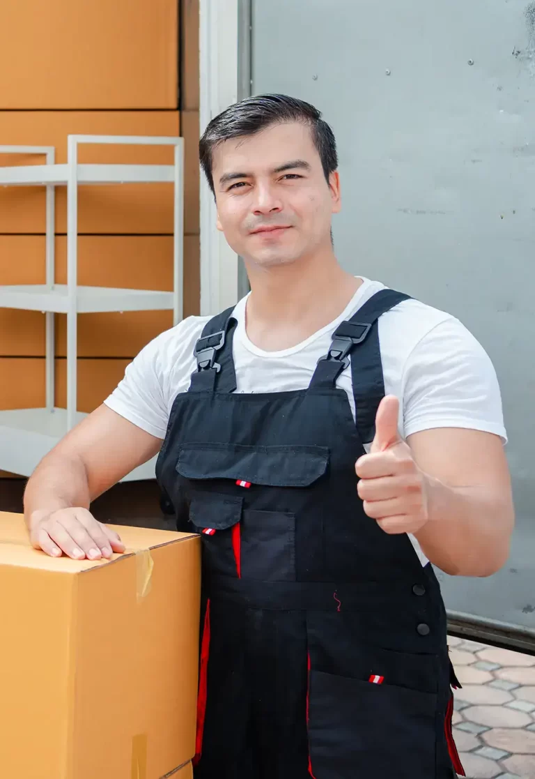 Cropped image of a worker giving a thumbs up